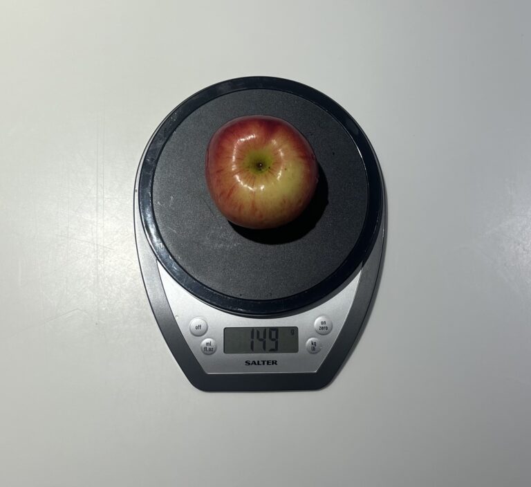Apple on a food weighing scale